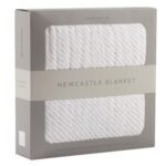 "Luxuriously Soft Spotted Wave Cotton Muslin Blanket offers cozy comfort for newborns. This stylish baby blanket features a spotted wave design, ensuring both warmth and style."