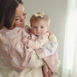 "Organic rainbow knit swaddle blankets for newborns, offering softness, comfort, and safety. Perfect for parents seeking premium quality."