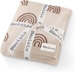 "Organic swaddle blankets in rainbow knit design, soft and safe for newborns. Keep your baby comfy and cozy with these luxurious blankets."
