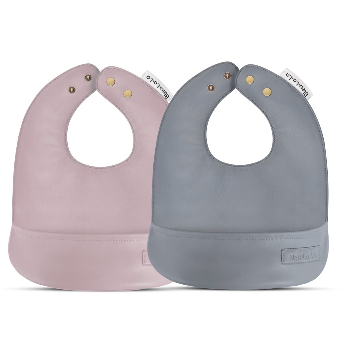 "set of cruelty-free vegan leather bibs for babies 0-12 months. Soft, durable, and easy to clean. A must-have for eco-conscious parents. Premium quality bibs for your little one. "