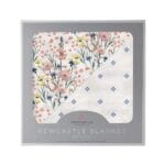 Wildflowers periwink Bamboo Newcastle Blanket in soft fabric, showcasing vibrant floral patterns.