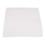 Wildflowers periwink Bamboo Newcastle Blanket displayed on a cozy sofa.